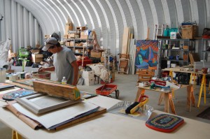 Newt, working inside of his studio, just as my arrival disrupted his concentration, causing him to down tools and leave.