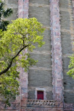 North face of Bok Tower, Florida, with balcony and red door.