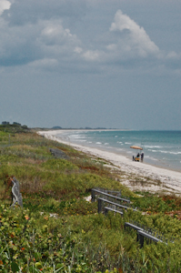 Just another day at the beach, in bizarre juxtaposition with active launch pads and abandoned ruins, all cheek by jowl at Cape Canaveral Air Force Station.